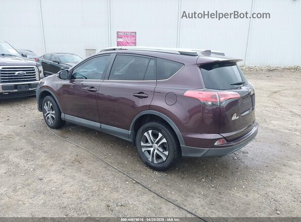2T3ZFREV3JW422727 2018 TOYOTA RAV4 Purple Trasero izquierdo