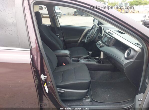 2T3ZFREV3JW422727 2018 TOYOTA RAV4 Purple Vista interior delantera