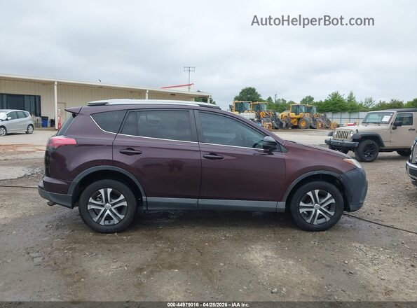 2T3ZFREV3JW422727 2018 TOYOTA RAV4 Purple Vista interior trasera