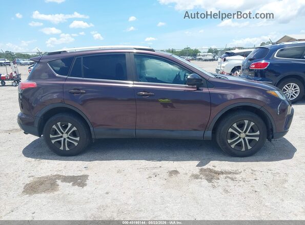 2T3ZFREV3JW431508 2018 TOYOTA RAV4 Maroon Rear interior view