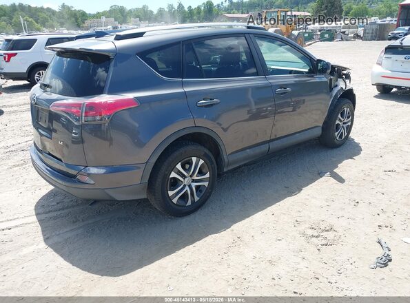 2T3ZFREV4JW450195 2018 TOYOTA RAV4 Gray Trasero derecho