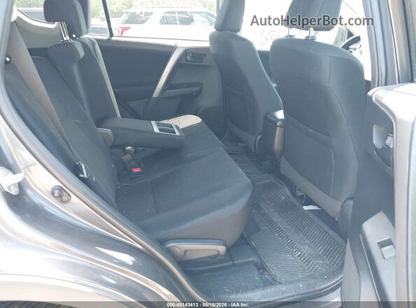 2T3ZFREV4JW450195 2018 TOYOTA RAV4 Gray Vista de la etiqueta del VIN