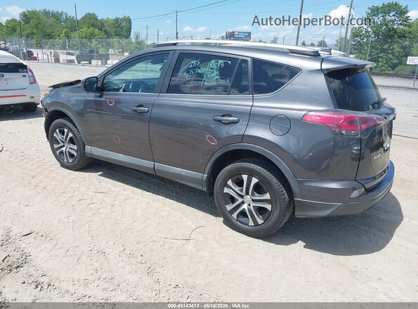 2T3ZFREV4JW450195 2018 TOYOTA RAV4 Gray Trasero izquierdo