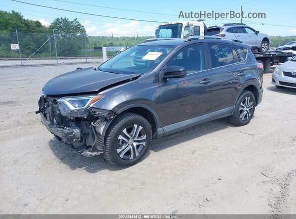 2T3ZFREV4JW450195 2018 TOYOTA RAV4 Gray Vista tres cuartos delantera izquierda