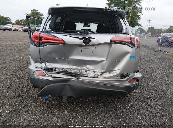 2T3ZFREV6HW335446 2017 TOYOTA LE Серебряный Вид спереди