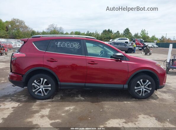 2T3ZFREV7JW407261 2018 TOYOTA LE Red Widok wnętrza z tyłu