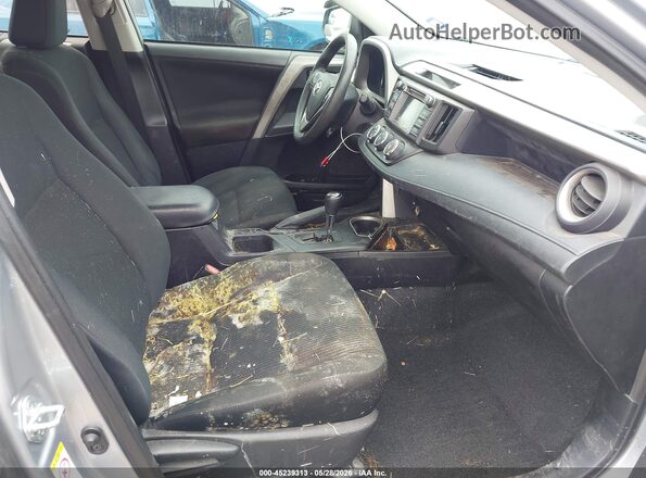 2T3ZFREV8HW352622 2017 TOYOTA RAV4 Silver Widok wnętrza z przodu
