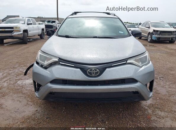 2T3ZFREV8HW352622 2017 TOYOTA RAV4 Silver 