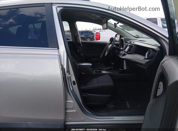 2T3ZFREV9GW240801 2016 TOYOTA RAV4 Silver Front interior view