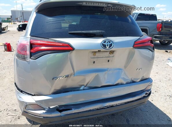 2T3ZFREV9GW240801 2016 TOYOTA RAV4 Silver Front view