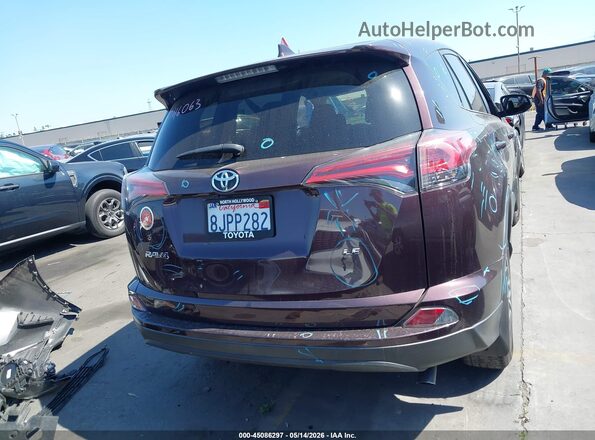 2T3ZFREV9JW515719 2018 TOYOTA LE Gray 