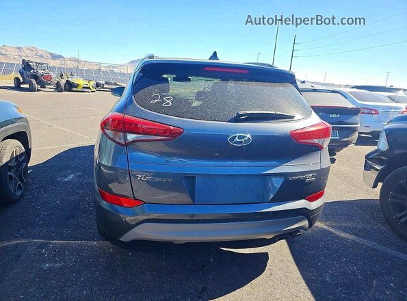 KM8J3CA23JU753508 2018 HYUNDAI TUCSON Gray 