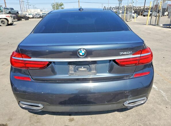 WBA7E4C51KGV28667 2019 BMW 7 SERIES Gray Вид салону спереду