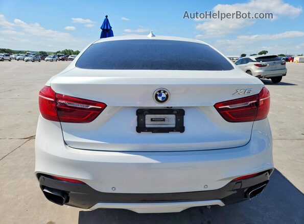 5UXKU2C36H0X46932 2017 BMW X6 Белый Вид салона спереди