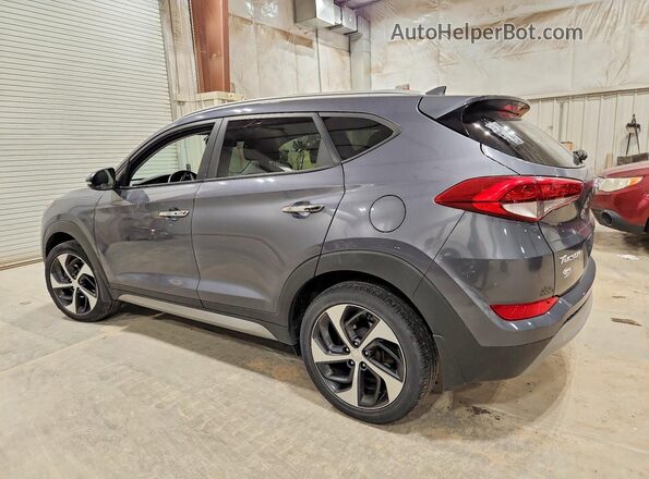 KM8J3CA24HU304820 2017 HYUNDAI TUCSON Серый 
