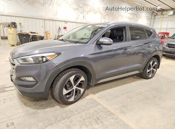 KM8J3CA24HU304820 2017 HYUNDAI TUCSON Серый 