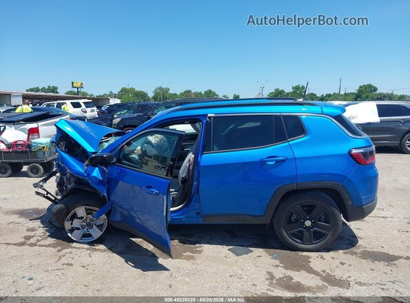 3C4NJCBB4NT192424 2022 JEEP COMPASS Light Blue Rear interior view