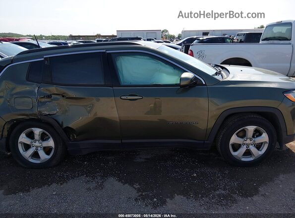 3C4NJCBB7JT267952 2018 JEEP COMPASS Green Rear interior view