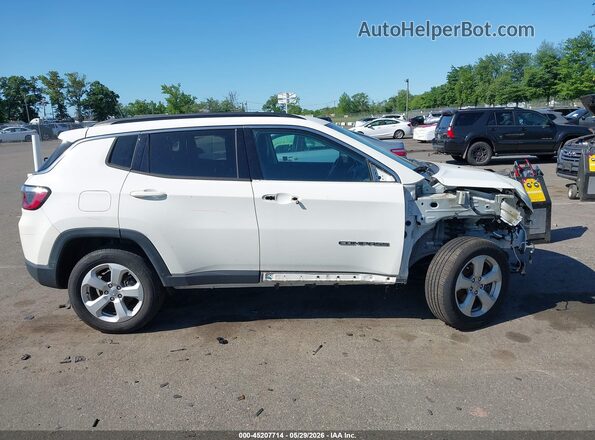 3C4NJDBB1MT544511 2021 JEEP COMPASS White Vista interior trasera