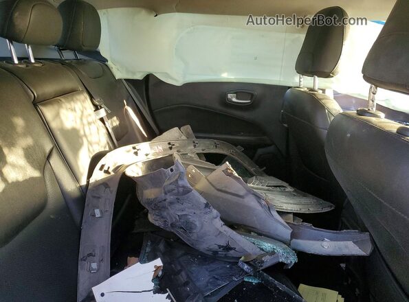 3C4NJDCB4MT533890 2021 JEEP COMPASS Burgundy Vista de los asientos traseros