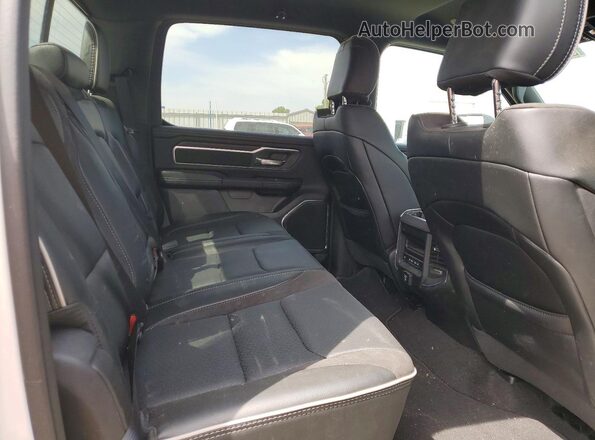 3C6SRFJPXT4180772 2026 RAM 1500 White Vista de los asientos traseros
