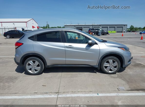 3CZRU6H51KM731044 2019 HONDA HR-V Серебряный Вид задней части салона