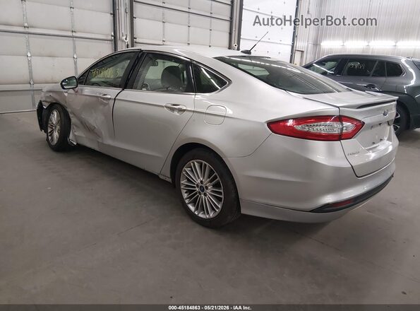3FA6P0H99GR264357 2016 FORD FUSION Silver Trasero izquierdo