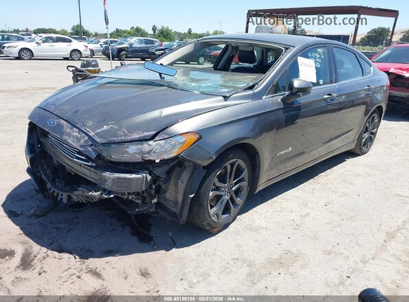 3FA6P0LU1HR300264 2017 FORD FUSION HYBRID Gray Vista tres cuartos delantera izquierda