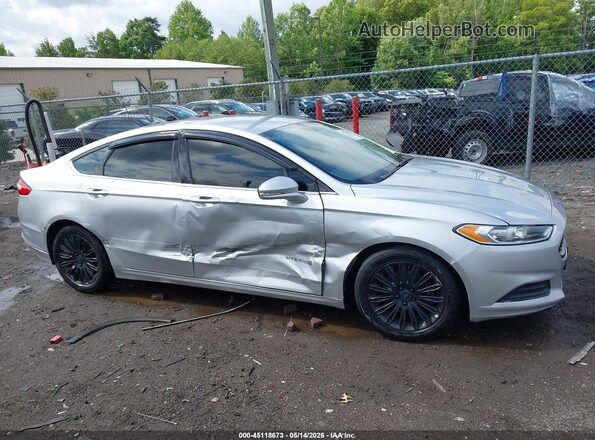 3FA6P0LU2GR389017 2016 FORD FUSION HYBRID Silver Սալոնի հետևի տեսք