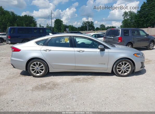 3FA6P0LU7KR224833 2019 FORD FUSION HYBRID Silver Вид задньої частини салону