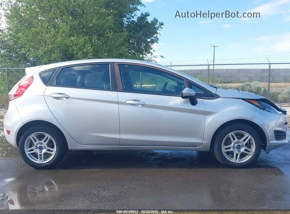 3FADP4EJXHM113104 2017 FORD FIESTA Silver Vista interior trasera