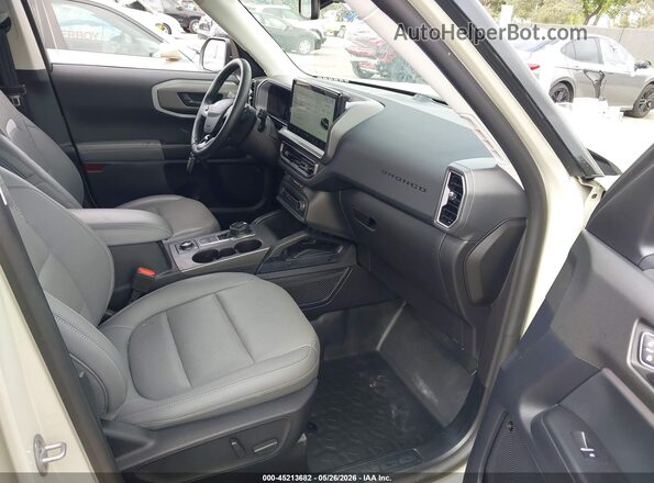 3FMCR9DA4SRE70699 2025 FORD BRONCO SPORT Cream Вид салону спереду