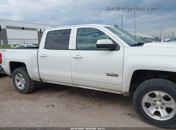 3GCUKREC0JG279840 2018 CHEVROLET SILVERADO White Widok wnętrza z tyłu