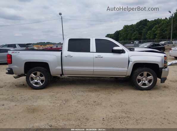 3GCUKREC4HG413503 2017 CHEVROLET SILVERADO Silver Widok wnętrza z tyłu