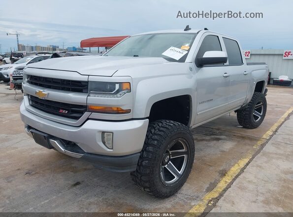 3GCUKREC9JG265600 2018 CHEVROLET SILVERADO Silver წინა მარცხენა ხედი სამი მეოთხედიდან