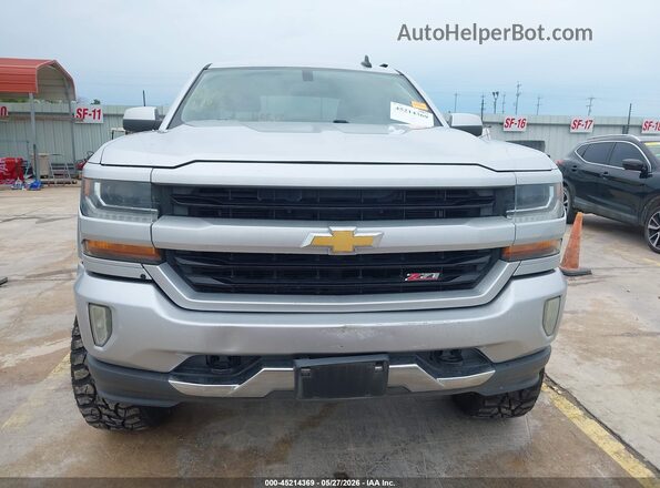3GCUKREC9JG265600 2018 CHEVROLET SILVERADO Silver ხელსაწყოთა პანელის ხედი