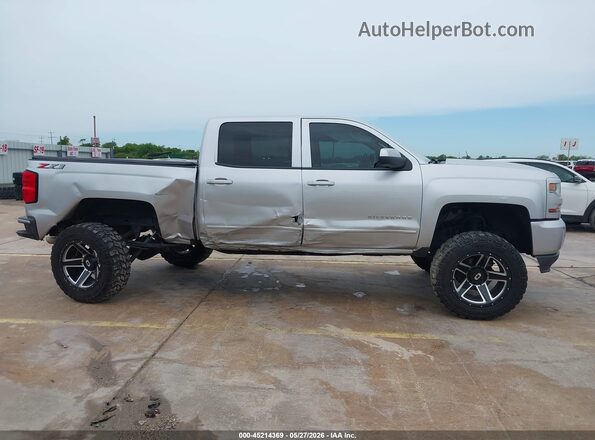 3GCUKREC9JG265600 2018 CHEVROLET SILVERADO Silver უკანა სალონის ხედი