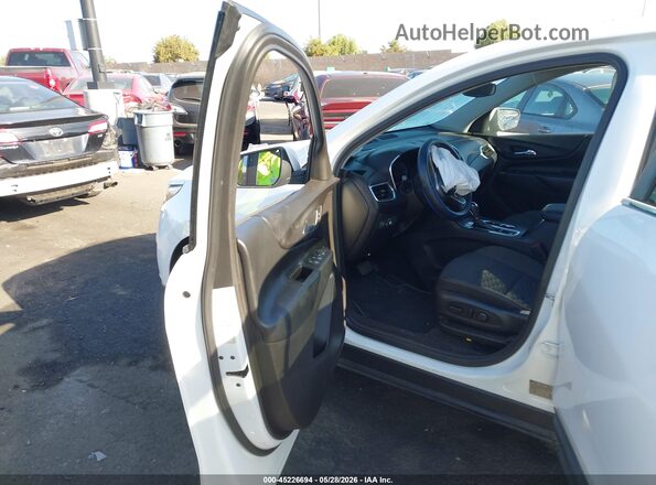 3GNAXJEV5JS575884 2018 CHEVROLET EQUINOX White Вид салону спереду