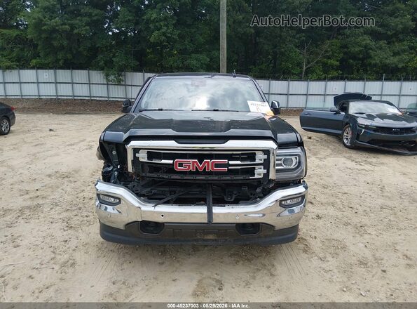 3GTU2NEC0JG312652 2018 GMC SIERRA Green Widok wnętrza z tyłu
