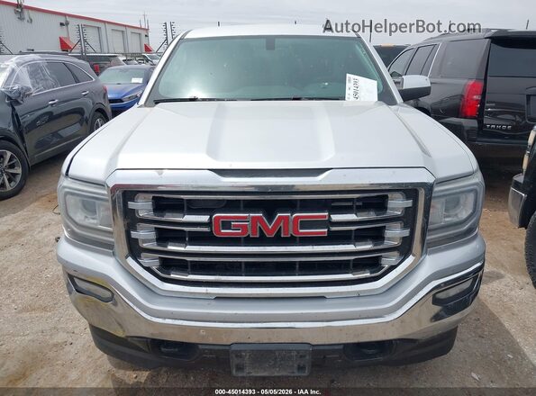 3GTU2NEC5JG591354 2018 GMC SIERRA Серебряный Вид щитка приборов