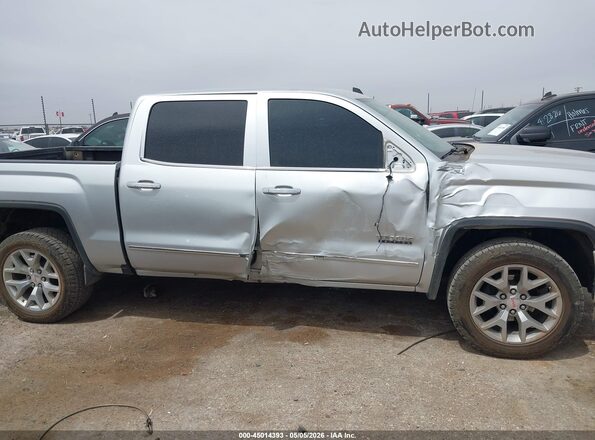 3GTU2NEC5JG591354 2018 GMC SIERRA Серебряный Вид задней части салона