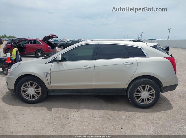 3GYFNBE34GS553841 2016 CADILLAC SRX Золотой Вид задней части салона
