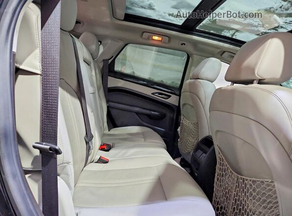 3GYFNEE30GS572565 2016 CADILLAC SRX Черный Вид задней части салона