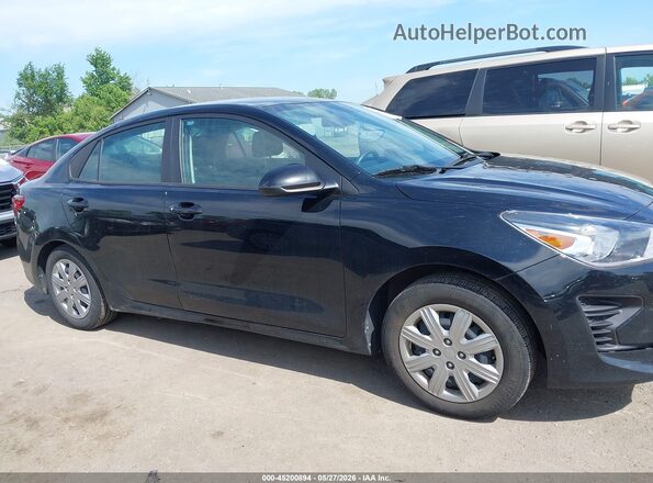 3KPA24AD0PE554454 2023 KIA RIO Black Vista interior trasera