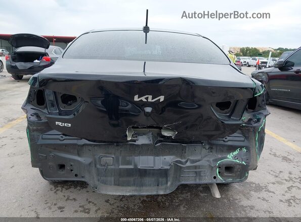 3KPA24AD1PE619859 2023 KIA RIO Black Front view