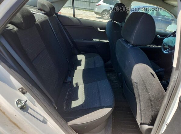 3KPA24AD3ME392802 2021 KIA RIO White Rear seats view