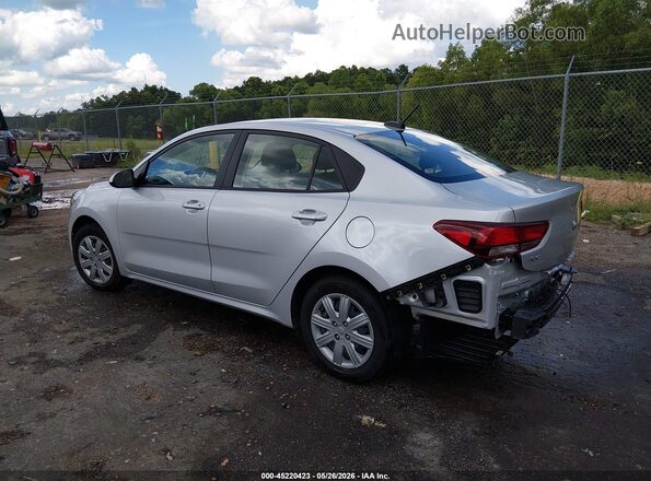 3KPA24AD3PE614484 2023 KIA RIO Silver Trasero izquierdo