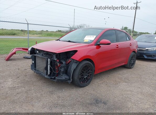 3KPA24AD4ME378178 2021 KIA RIO Red წინა მარცხენა ხედი სამი მეოთხედიდან