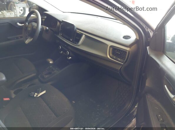 3KPA24AD5PE572982 2023 KIA RIO Black Вид салону спереду