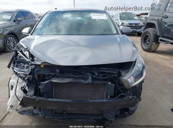 3KPA24AD7PE537554 2023 KIA RIO Серебряный Вид задней части салона